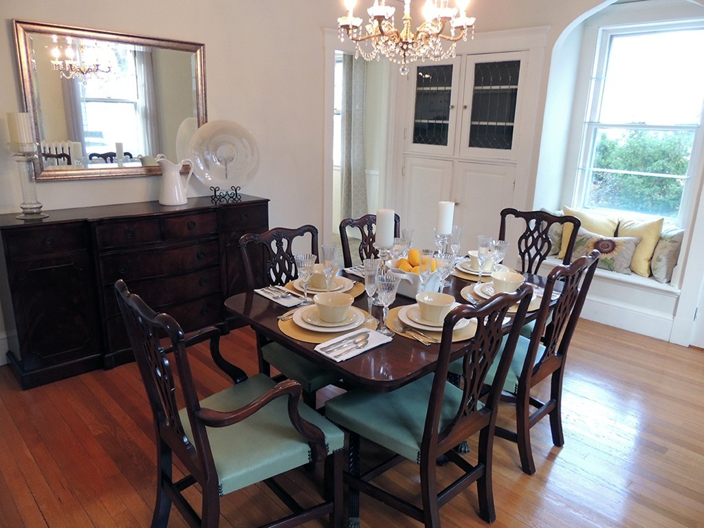 22 Symmes Road Winchester, MA 01890 - Photo 4 of 20 a dining room with furniture a chandelier and wooden floor