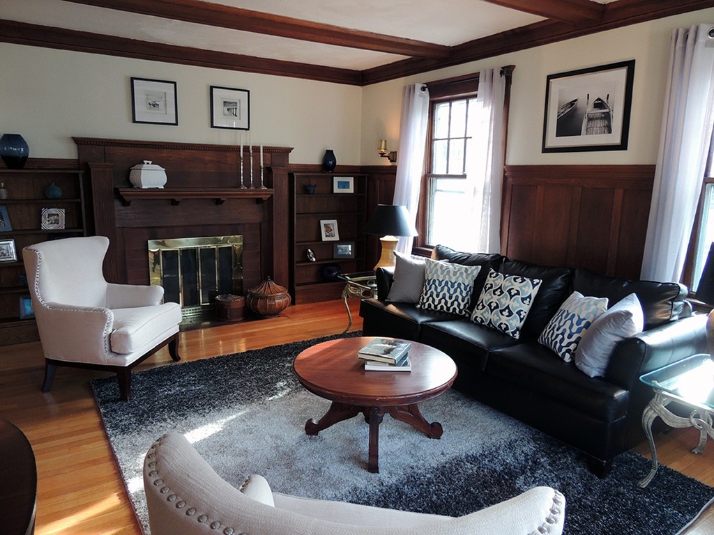 22 Symmes Road Winchester, MA 01890 - Photo 5 of 20 a living room with furniture a lamp and a fireplace
