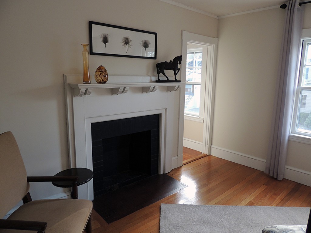 22 Symmes Road Winchester, MA 01890 - Photo 7 of 20 a living room with furniture and a fireplace