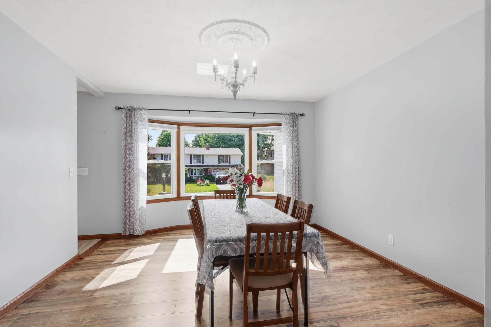 4314 Spring Street Davenport, IA 52807 - Photo 23 of 51 a view of a dining room with furniture window and outside view