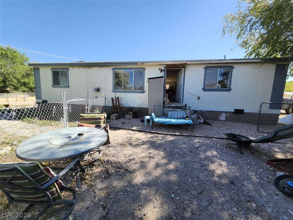 942 Holt Caliente, NV 89008 - Photo 1 of 22 A private yard offers ample space for outdoor relaxation and activities.