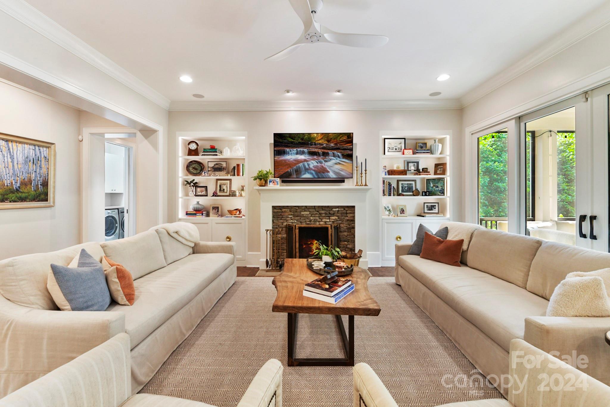 3201 Wickersham Road Charlotte, NC 28211 - Photo 14 of 43 a living room with furniture and a fireplace
