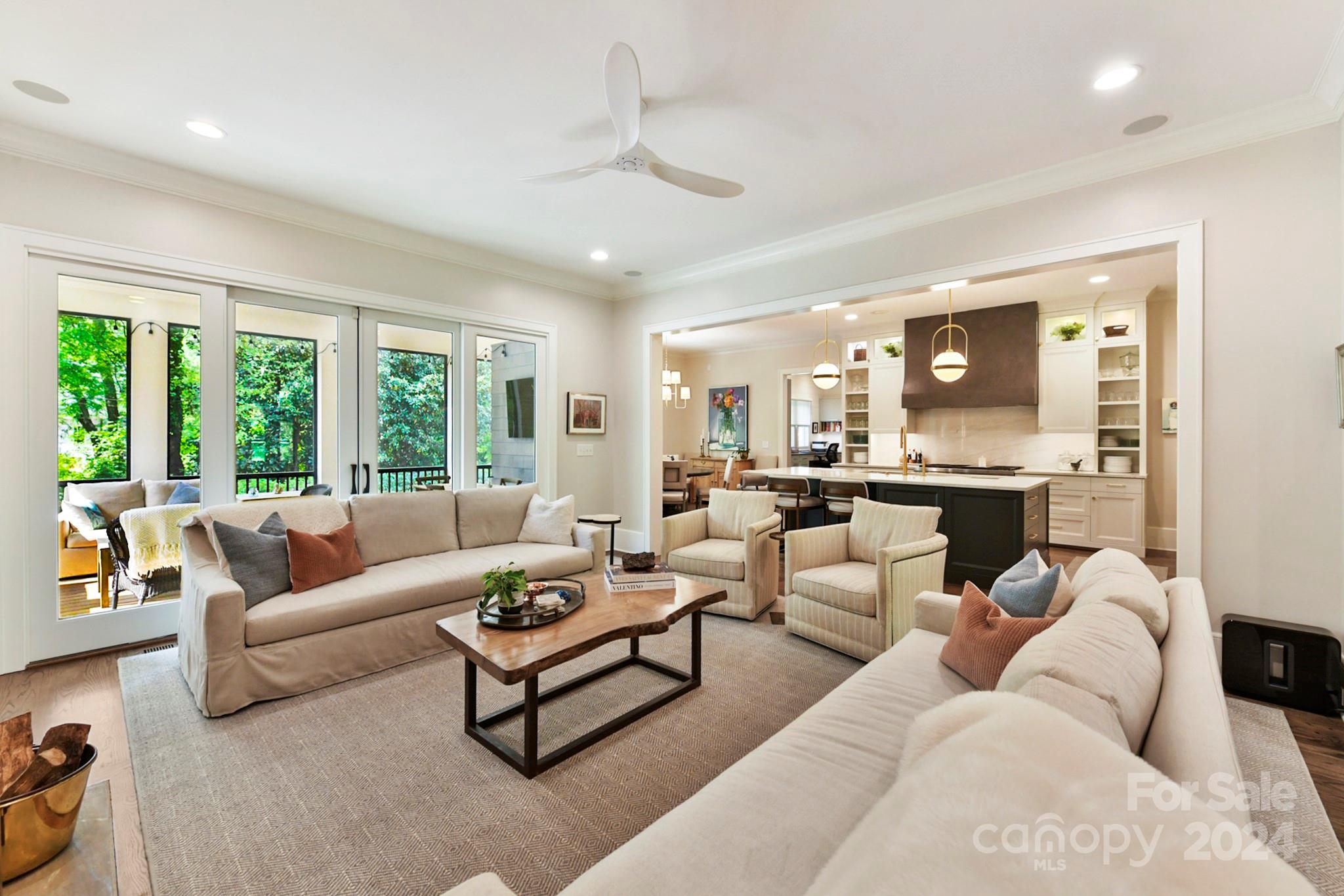 3201 Wickersham Road Charlotte, NC 28211 - Photo 16 of 43 a living room with furniture and a large window with outer view