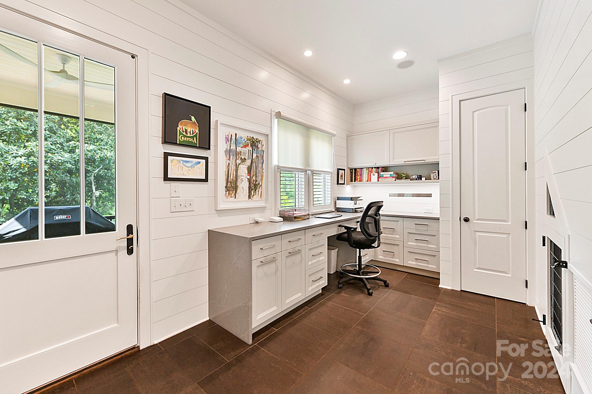 3201 Wickersham Road Charlotte, NC 28211 - Photo 17 of 43 a view of a room with workspace and windows