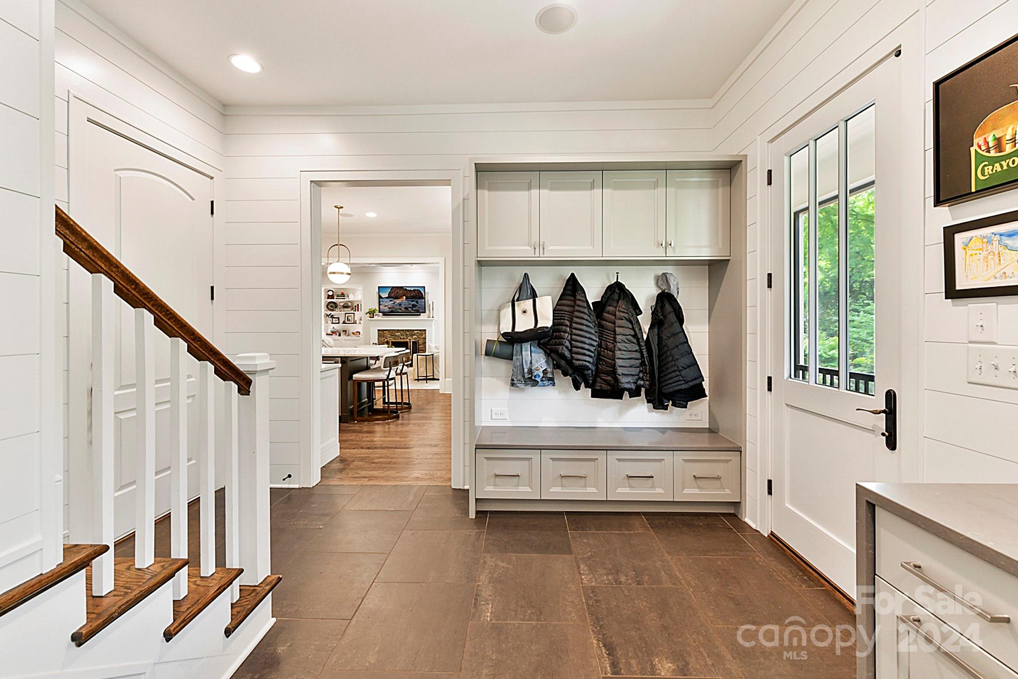 3201 Wickersham Road Charlotte, NC 28211 - Photo 18 of 43 a view of entryway with wooden floor and windows