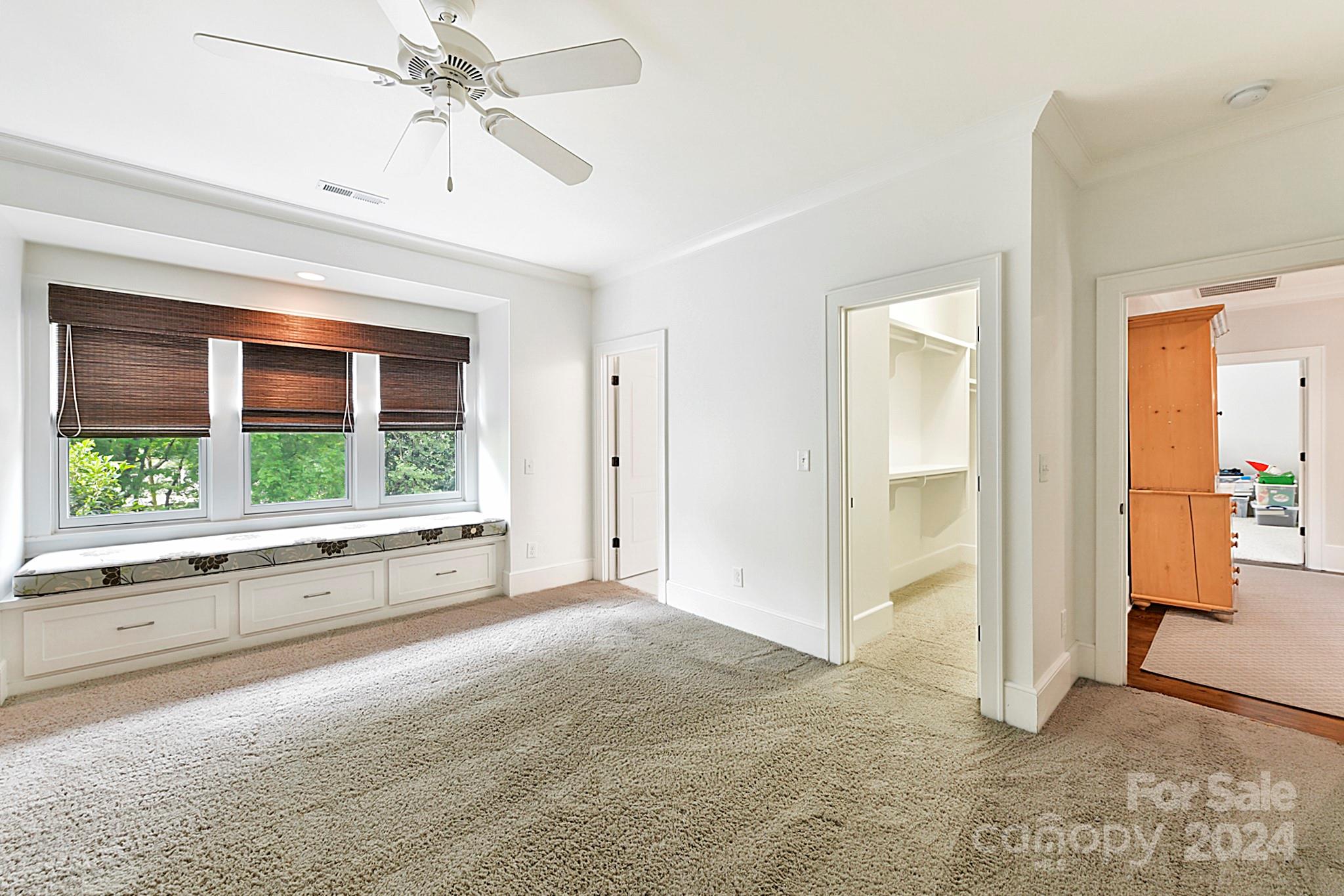 3201 Wickersham Road Charlotte, NC 28211 - Photo 23 of 43 an open kitchen view with fireplace and windows