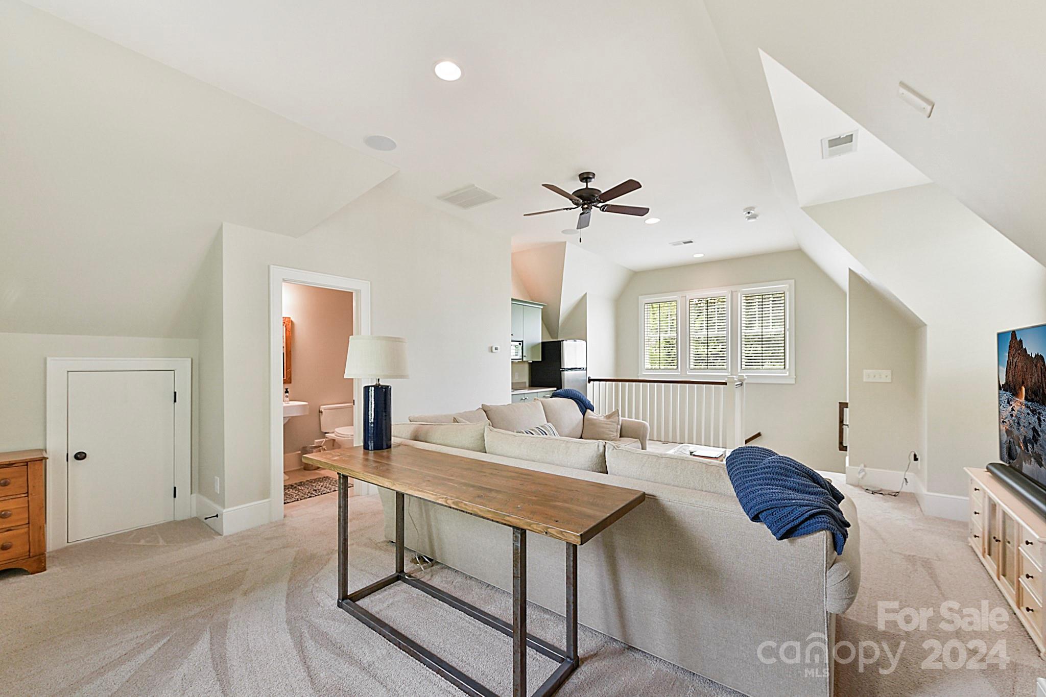3201 Wickersham Road Charlotte, NC 28211 - Photo 31 of 43 a living room with furniture and a large window