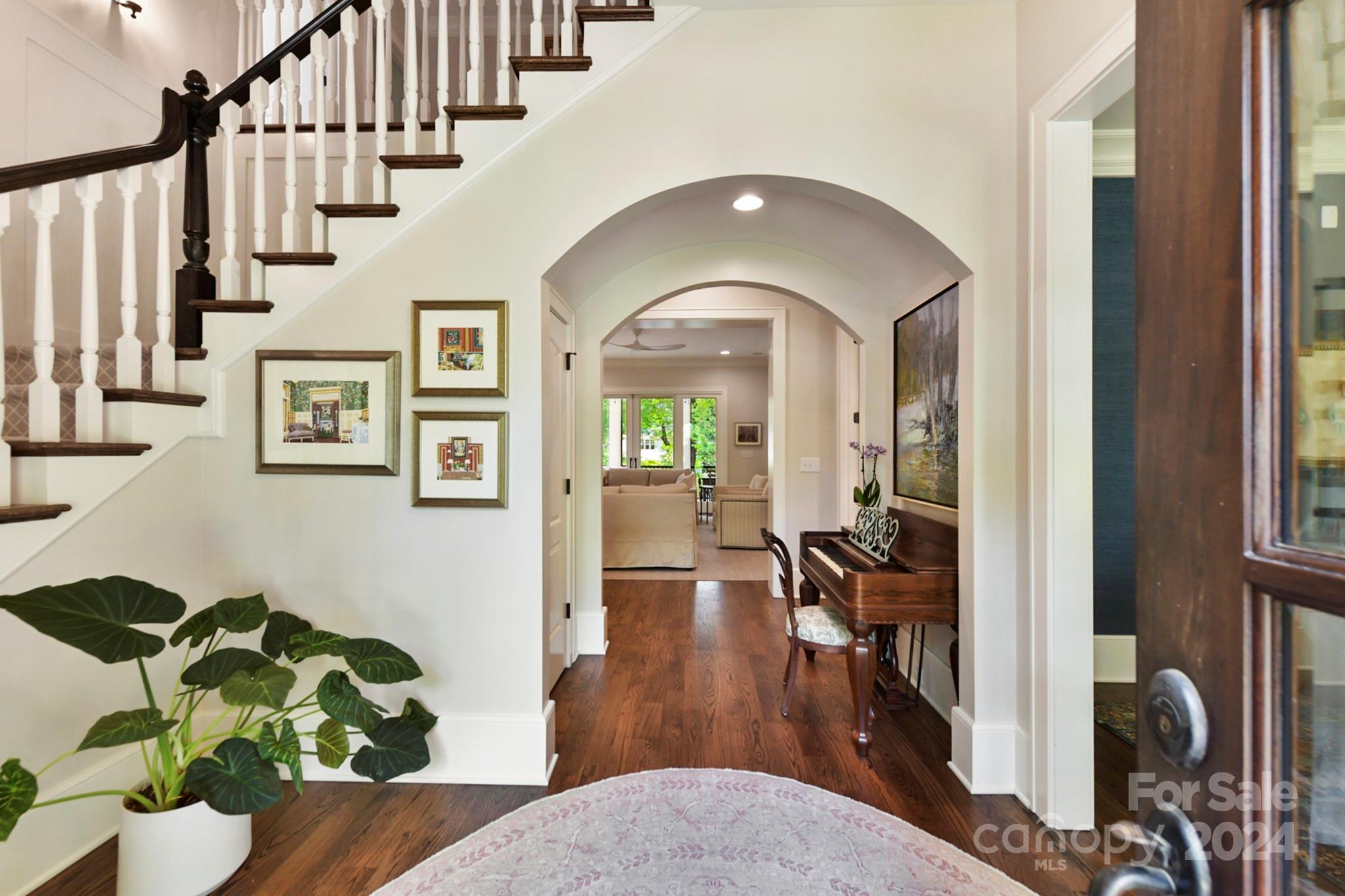 3201 Wickersham Road Charlotte, NC 28211 - Photo 4 of 43 a view of entryway and hall with wooden floor