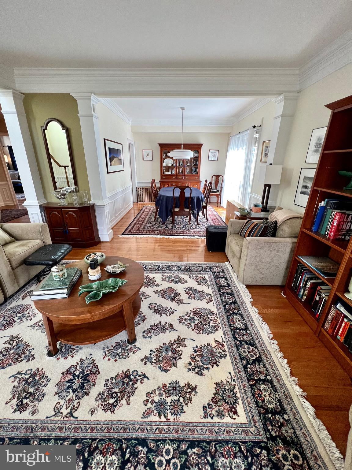 9706 Hidden Valley Road Vienna, VA 22181 - Photo 25 of 43 a living room with furniture and a mirror