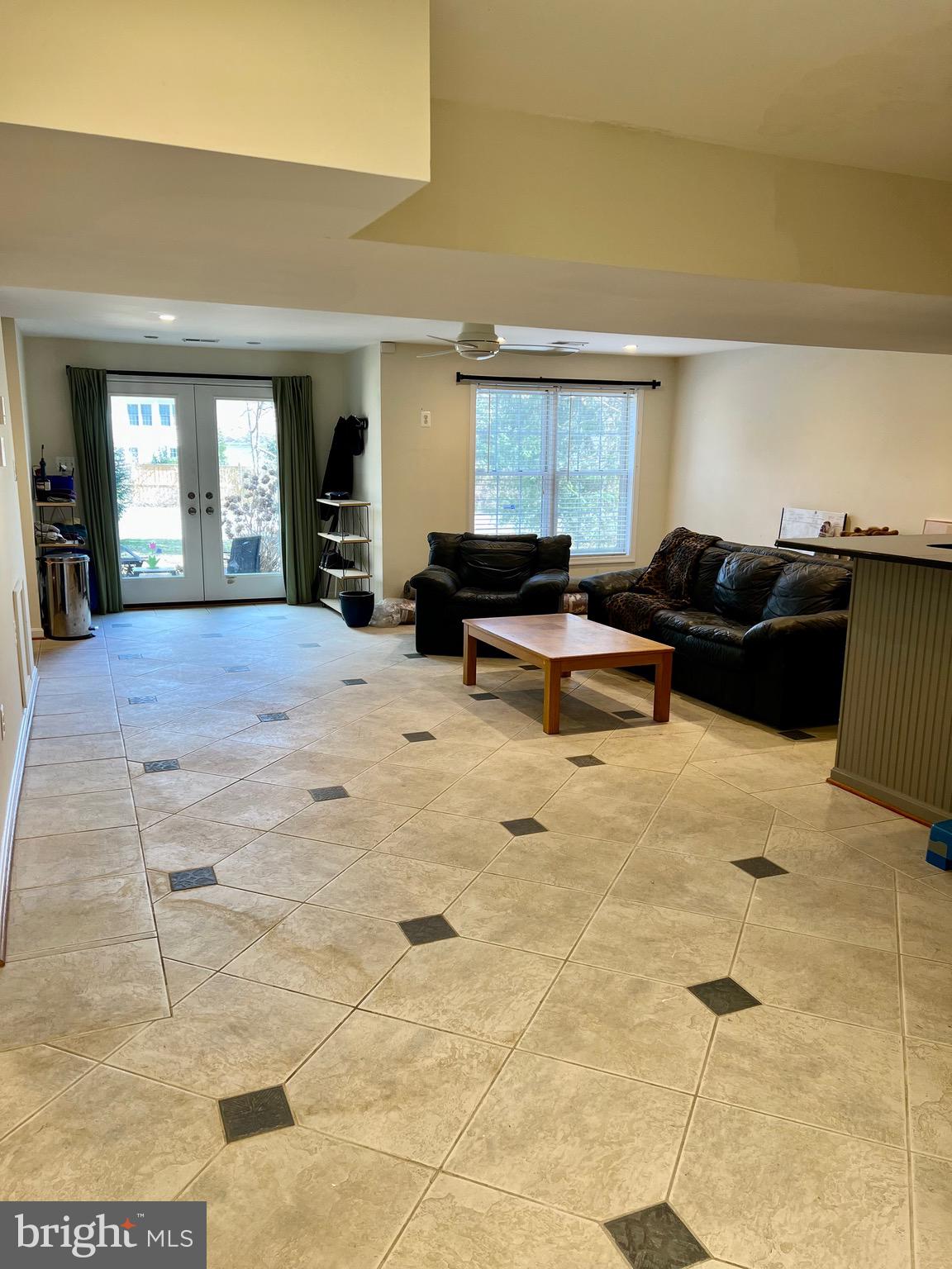 9706 Hidden Valley Road Vienna, VA 22181 - Photo 39 of 43 a living room with furniture and window
