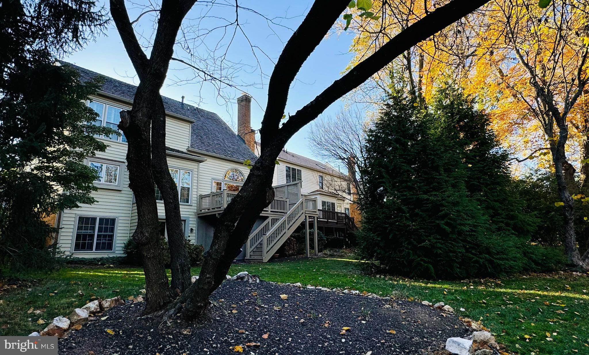 9706 Hidden Valley Road Vienna, VA 22181 - Photo 4 of 43 a front view of a house with garden