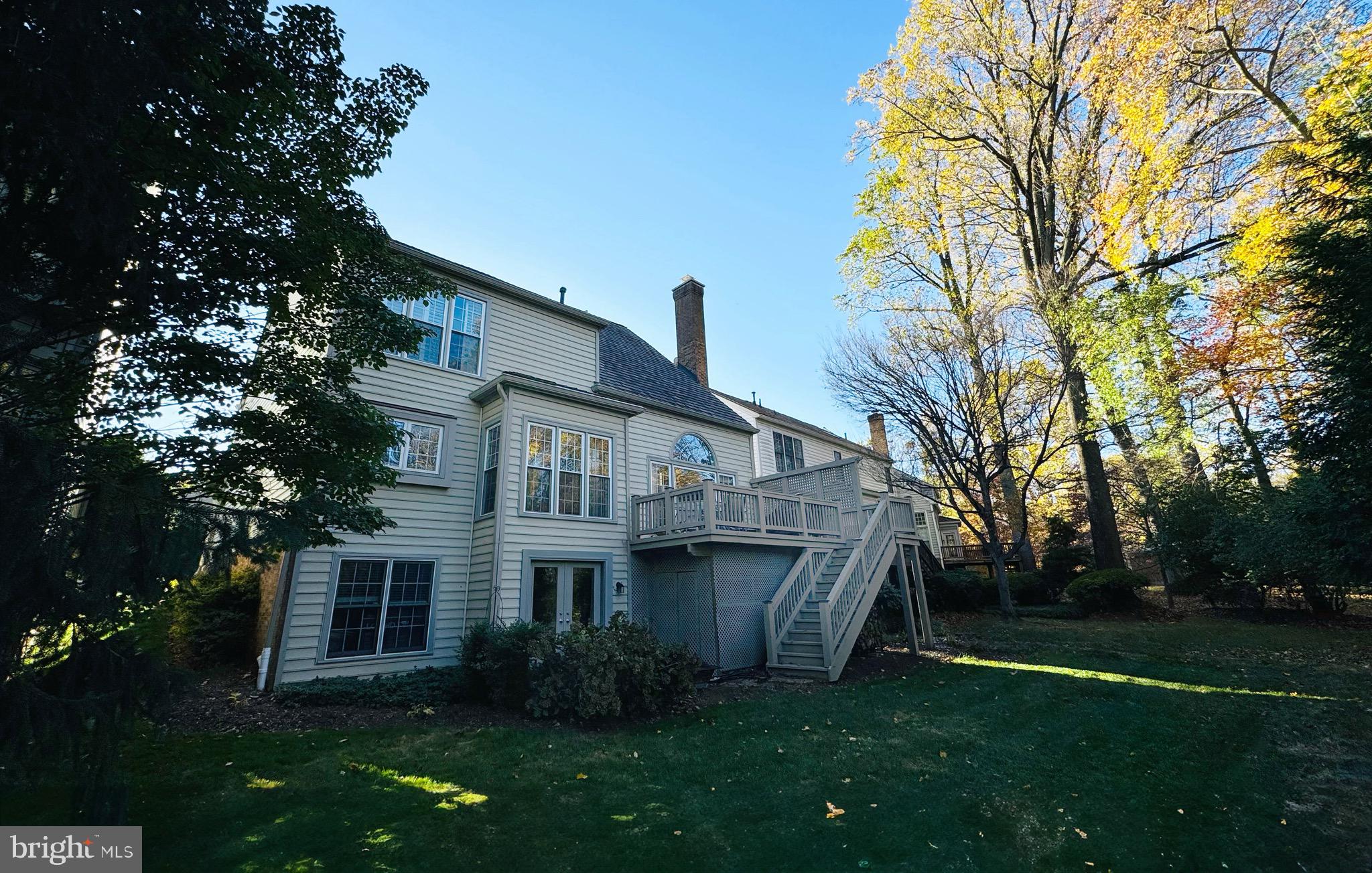9706 Hidden Valley Road Vienna, VA 22181 - Photo 5 of 43 a front view of a house with a garden