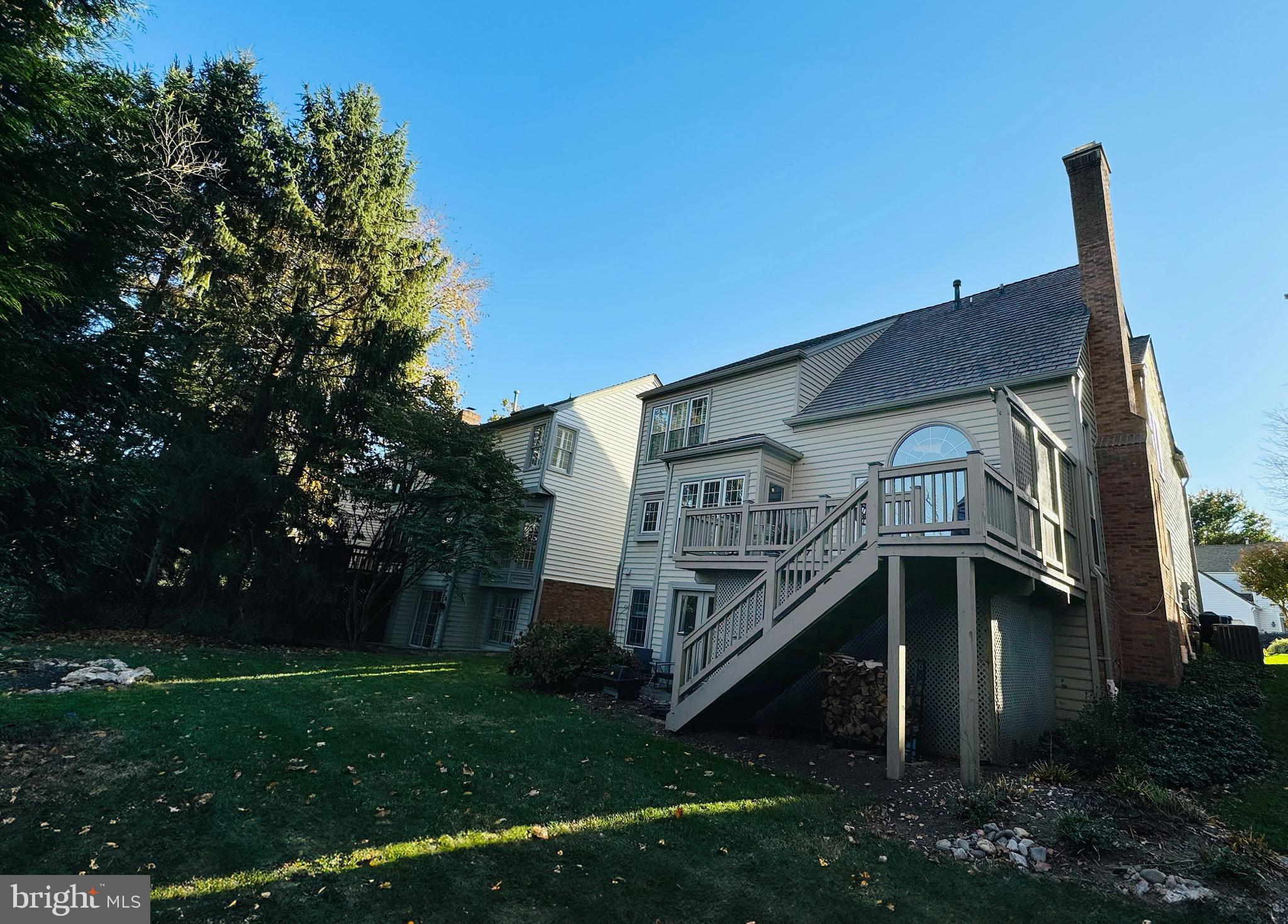 9706 Hidden Valley Road Vienna, VA 22181 - Photo 9 of 43 a house view with a garden space