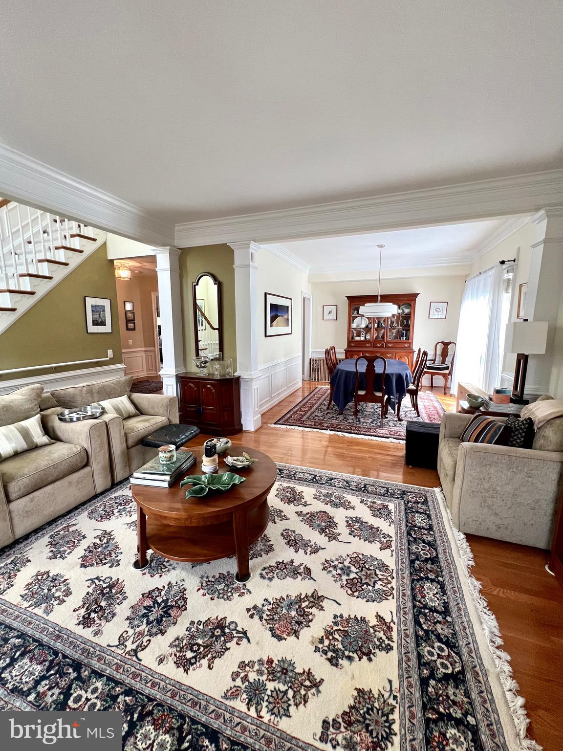 9706 Hidden Valley Road Vienna, VA 22181 - Photo 10 of 43 a living room with furniture and a fireplace