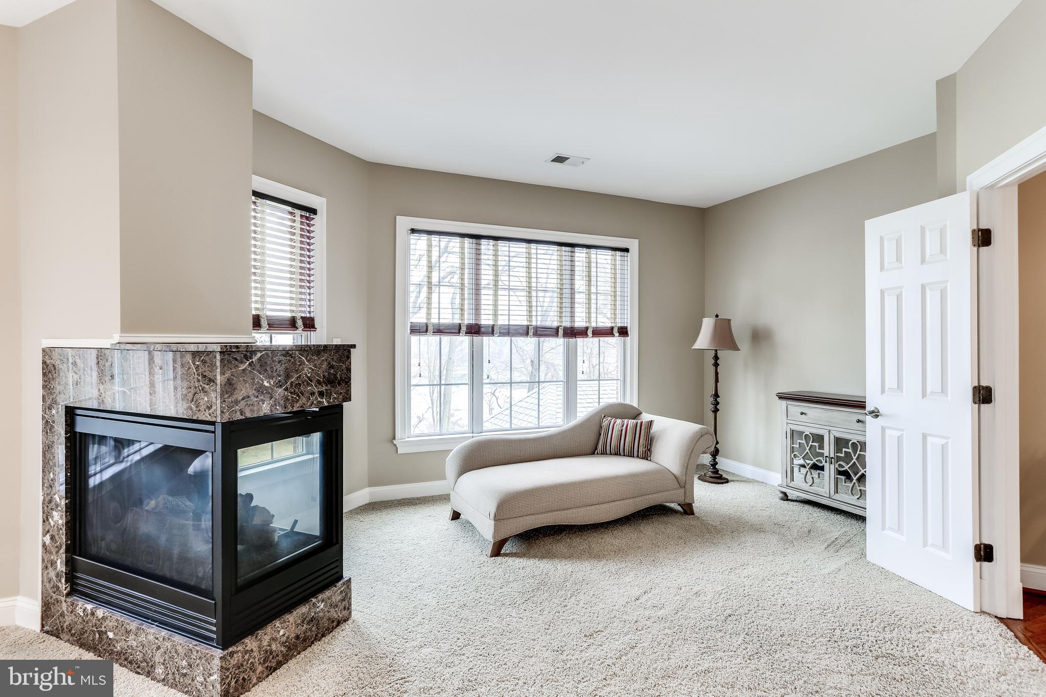 7673 Colonial Beach Road Pasadena, MD 21122 - Photo 47 of 86 Gas fireplace plus sitting area