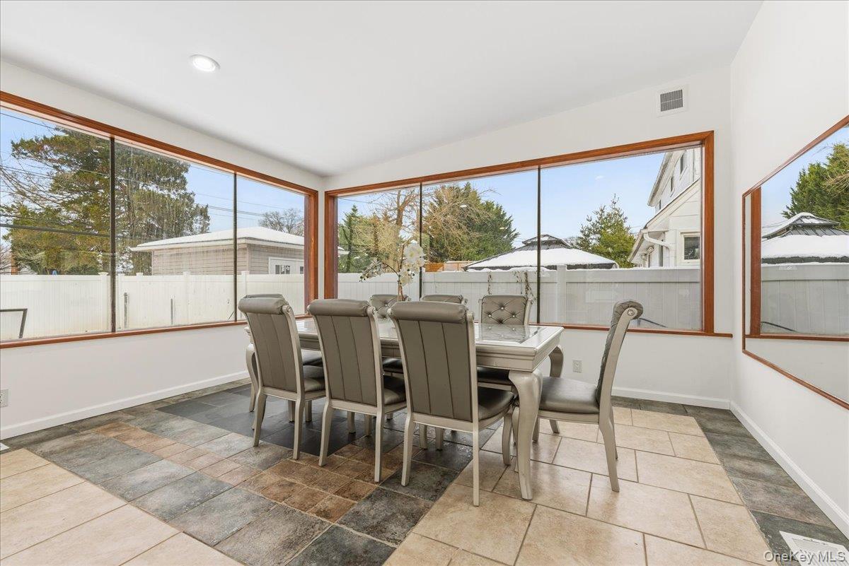 85 Briarcliff Road Westbury, NY 11590 - Photo 17 of 31 Sunroom featuring healthy amount of natural light