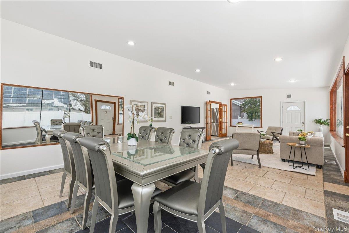 85 Briarcliff Road Westbury, NY 11590 - Photo 18 of 31 Dining room featuring recessed lighting