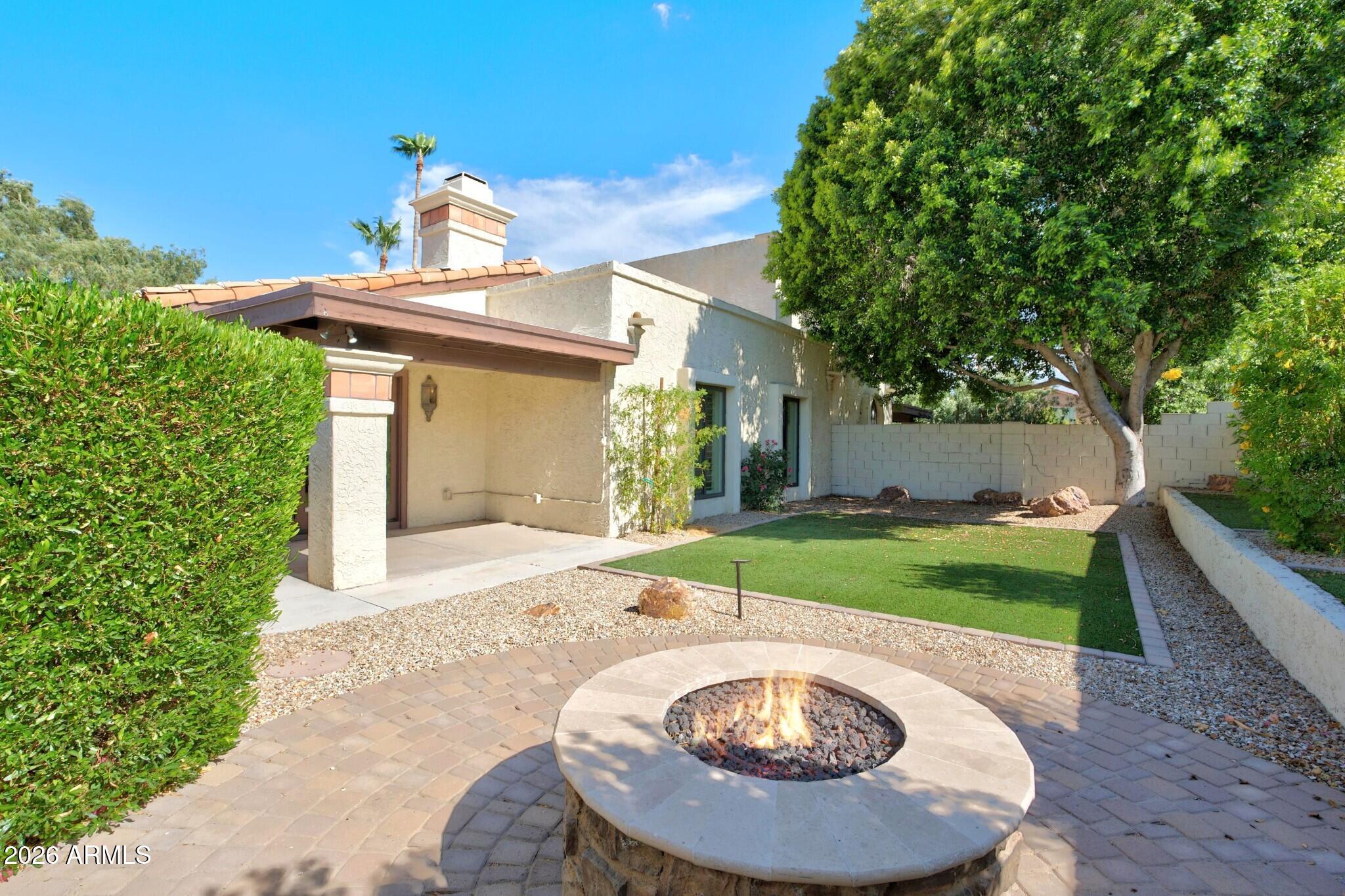 4615 East Monte Way Phoenix, AZ 85044 - Photo 9 of 35 a house view with a backyard space
