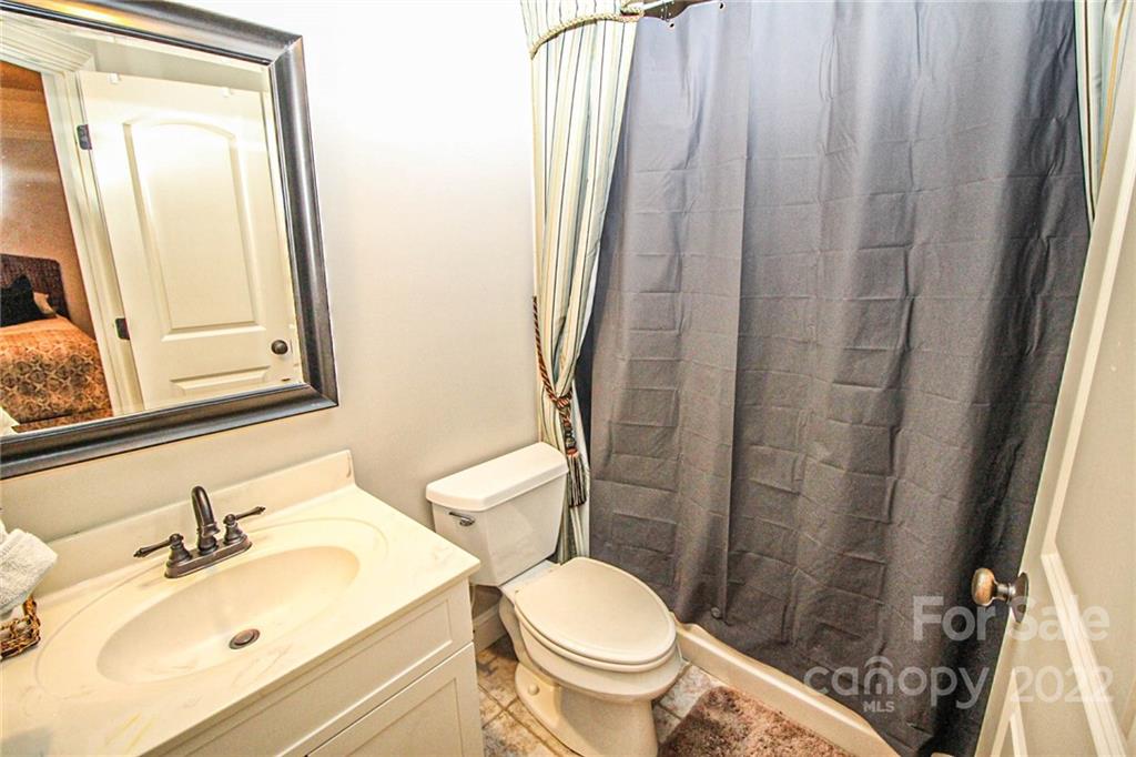 3239 Millstone Creek Road Lancaster, SC 29720 - Photo 34 of 48 a bathroom with a sink toilet and shower