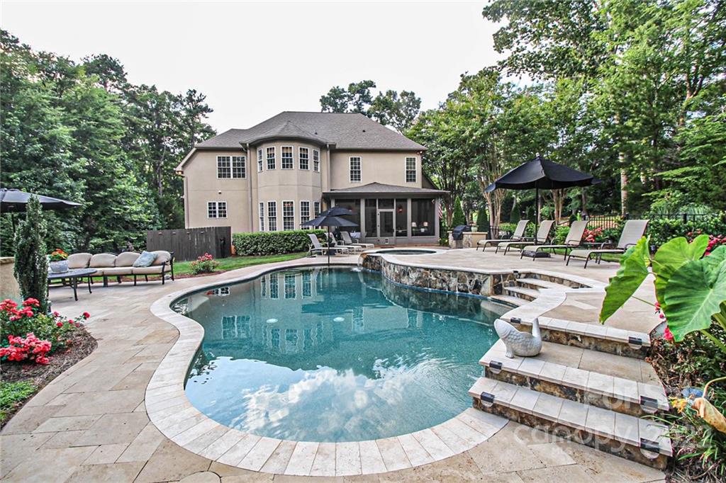 3239 Millstone Creek Road Lancaster, SC 29720 - Photo 48 of 48 a view of a house with swimming pool and sitting area