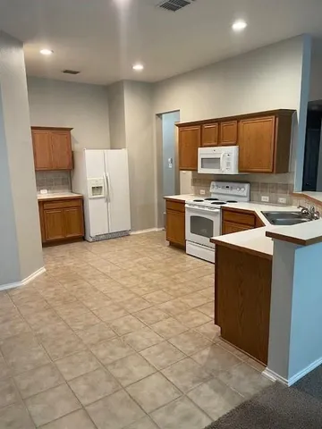 a view of kitchen and window