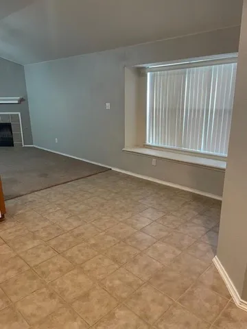 a kitchen with stainless steel appliances a stove sink and microwave