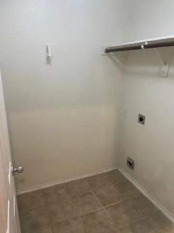 a kitchen with a sink and a stove top oven