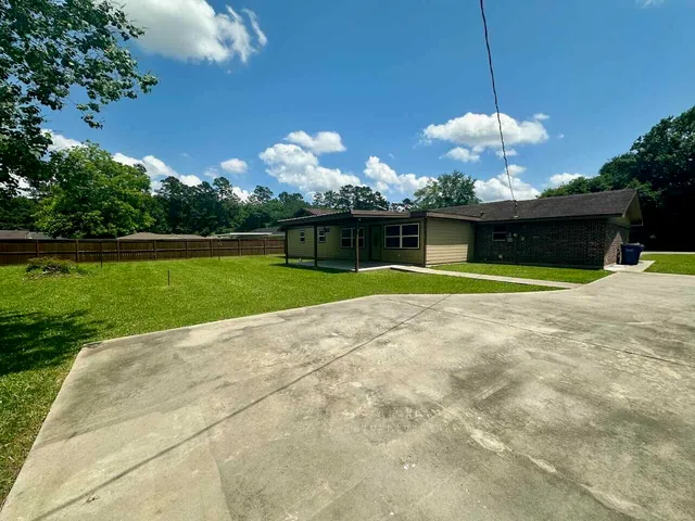 a view of a house with a swimming pool