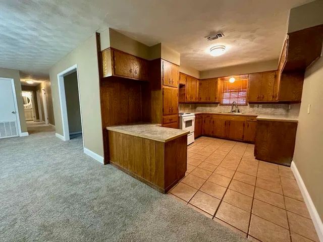 a kitchen with a cabinets and counter space