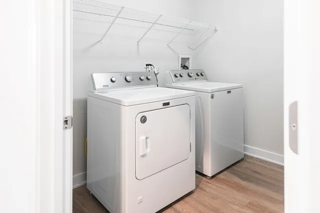 a utility room with dryer and washer