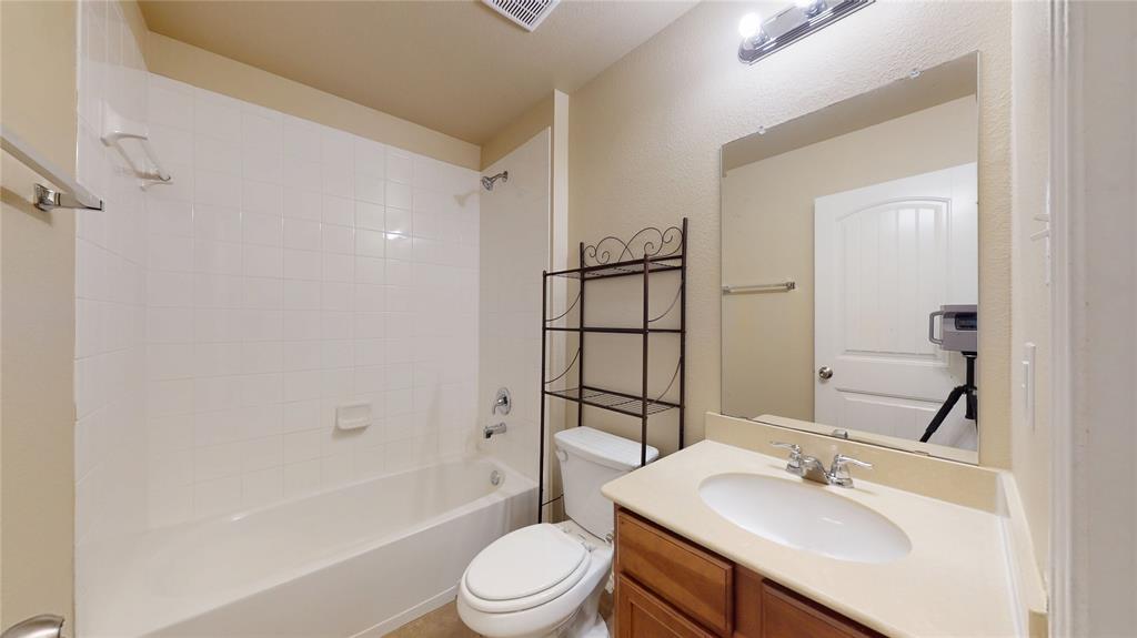 471 Harding Lane Lavon, TX 75166 - Photo 13 of 19 Full bathroom with vanity and shower / bathtub combination