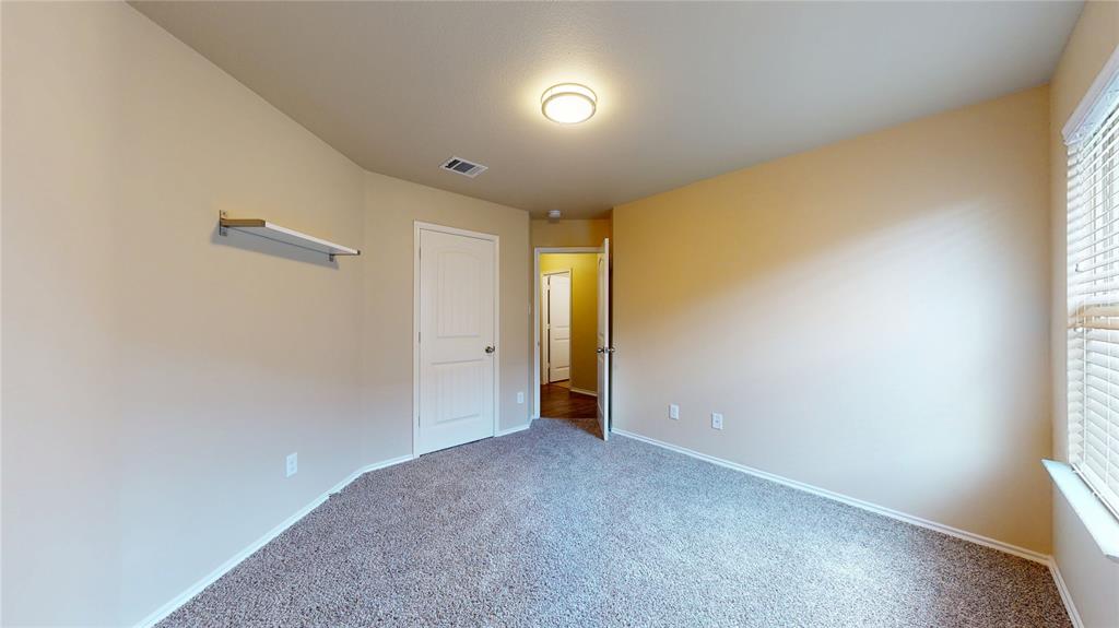 471 Harding Lane Lavon, TX 75166 - Photo 14 of 19 Unfurnished bedroom with baseboards and carpet