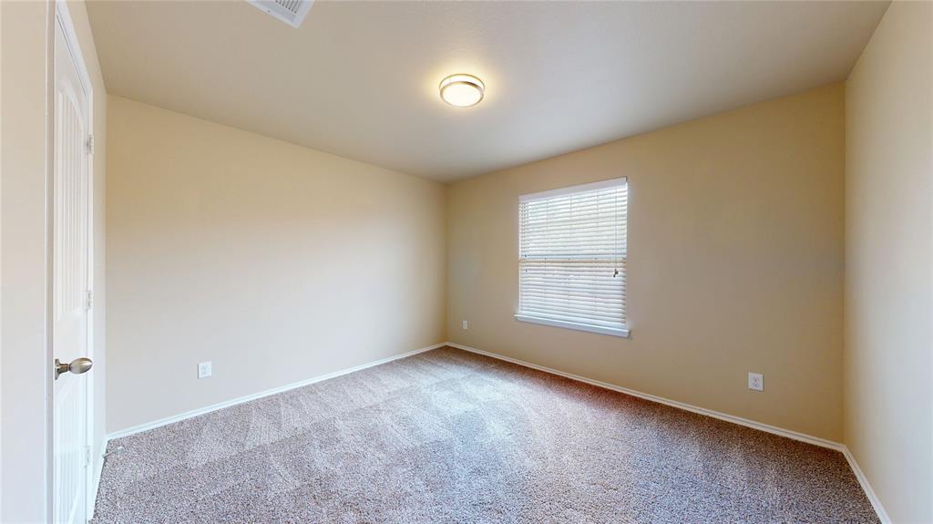 471 Harding Lane Lavon, TX 75166 - Photo 15 of 19 Empty room with light carpet and baseboards