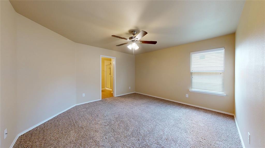 471 Harding Lane Lavon, TX 75166 - Photo 9 of 19 Empty room featuring light colored carpet and ceiling fan