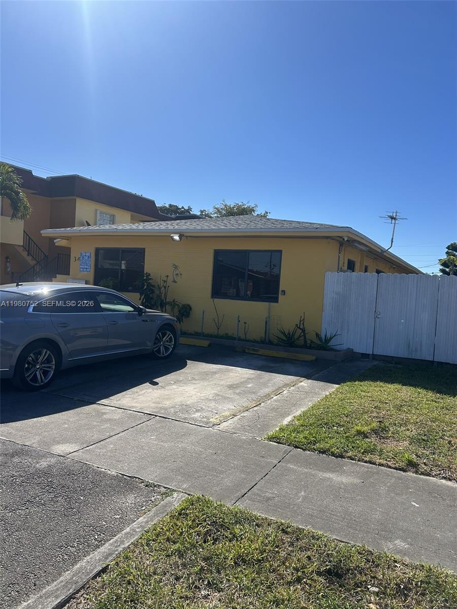 34 West 31st Street, Unit 4 Hialeah, FL 33012 - Photo 14 of 14 a view of a car parked in front of a house