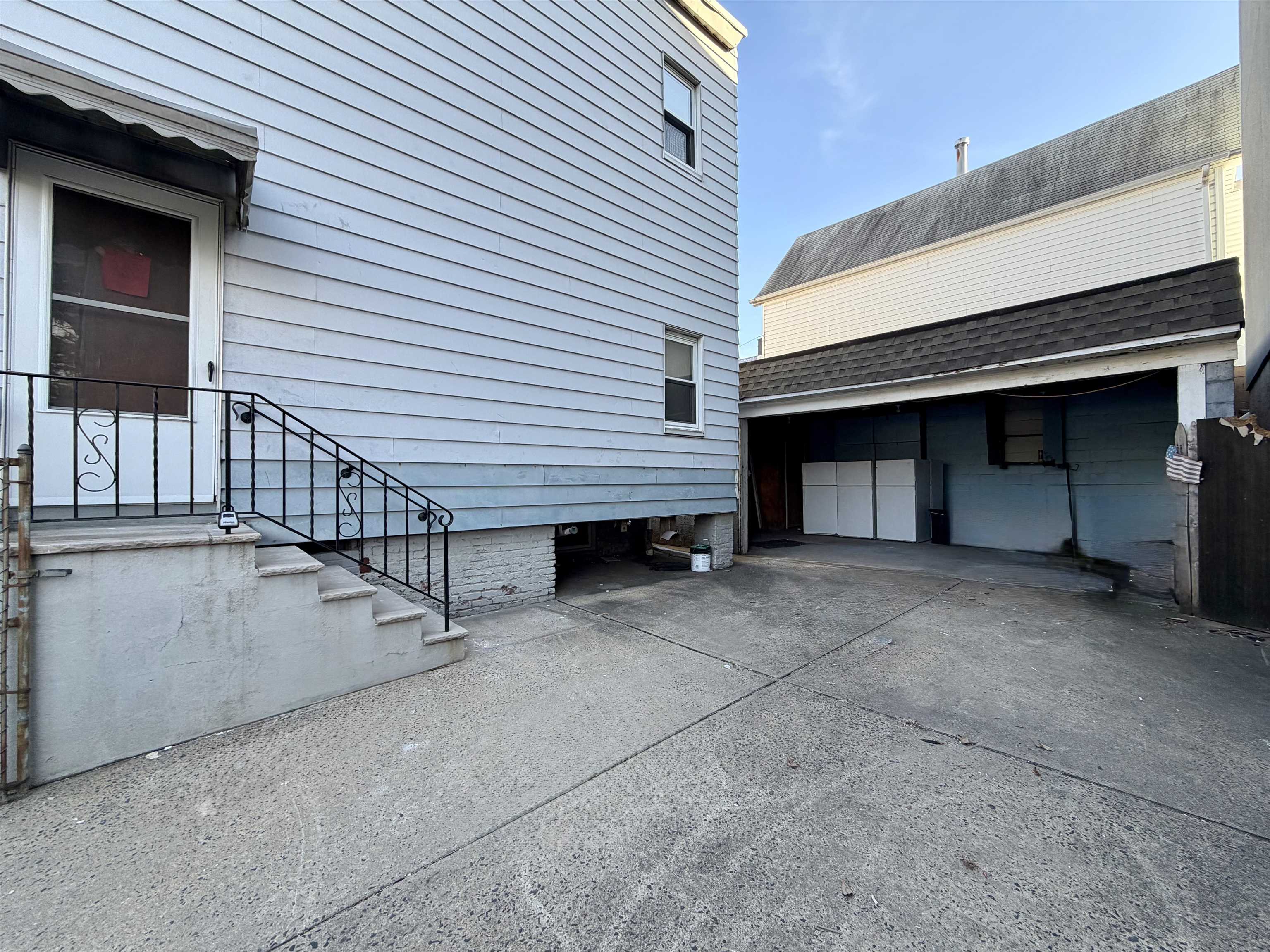 67 Elm Road, Unit 4 Newark, NJ 07105 - Photo 6 of 9 a view of a house with wooden stairs