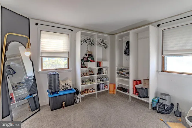 a room with furniture and a window