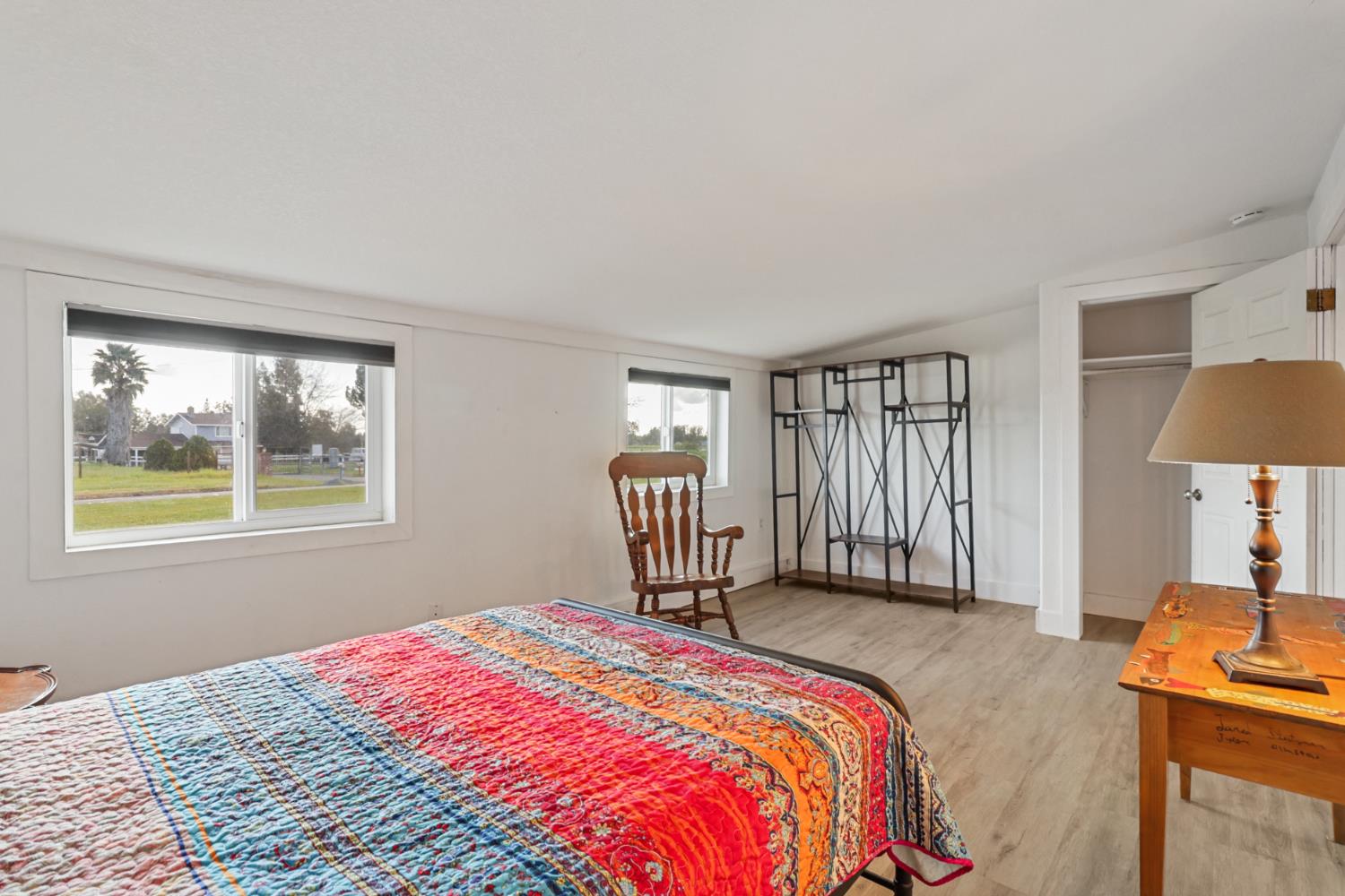 10695 Calvine Road Sacramento, CA 95830 - Photo 12 of 26 a bedroom with a bed and a window