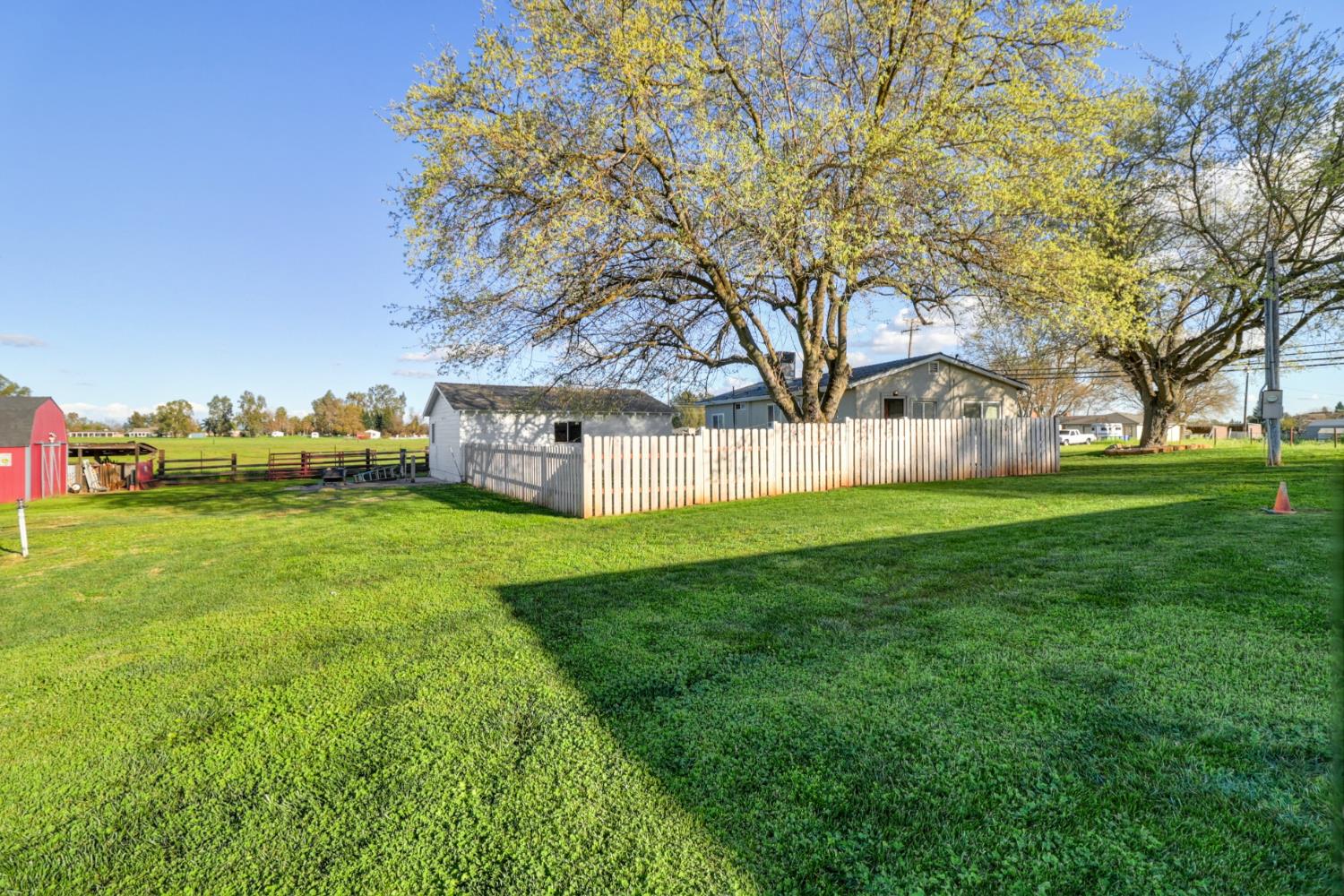 10695 Calvine Road Sacramento, CA 95830 - Photo 16 of 26 a view of a house with backyard and garden