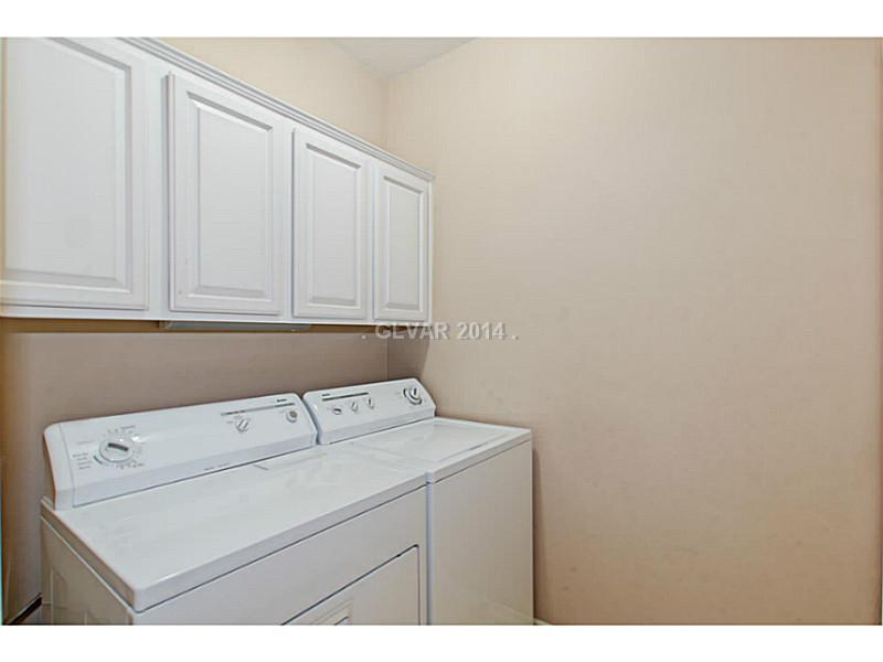 905 Collingtree Street Las Vegas, NV 89145 - Photo 14 of 35 Property Photo. Laundry w/ Built in Cabinet Storage. Washer & Dryer included