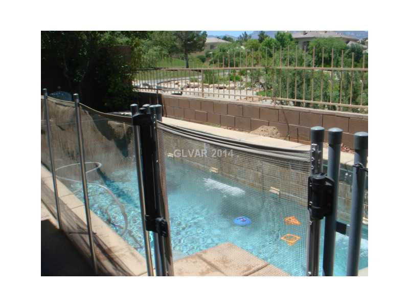 905 Collingtree Street Las Vegas, NV 89145 - Photo 27 of 35 Swimming Pool/Hot Tub/Sauna. Removable Fence at your Personal Pool overlooking the Golf Course