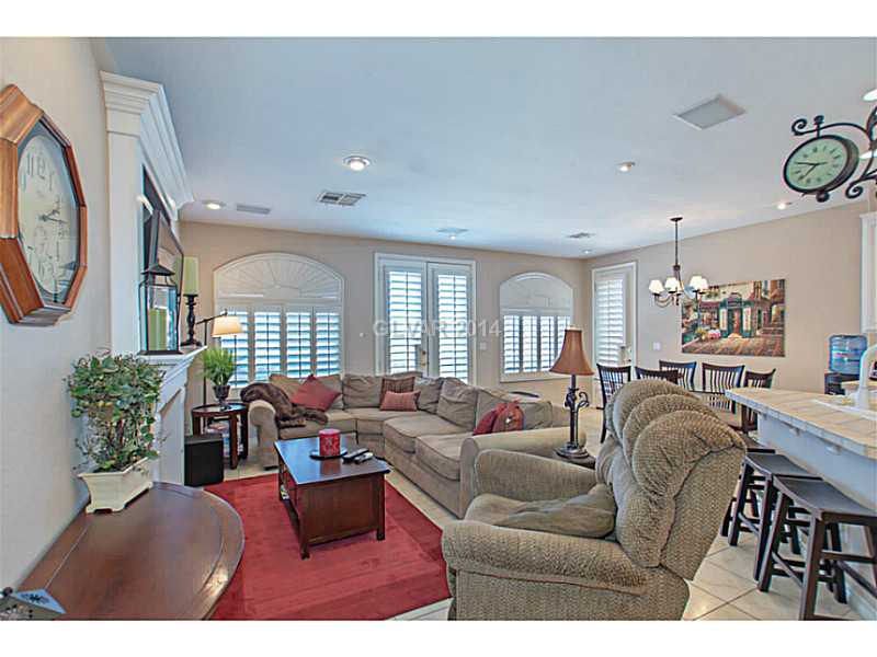 905 Collingtree Street Las Vegas, NV 89145 - Photo 6 of 35 Den. Great Room w/ Many Upgrades including Travertine Tile, Custom Shutters, Recessed Lighting & More