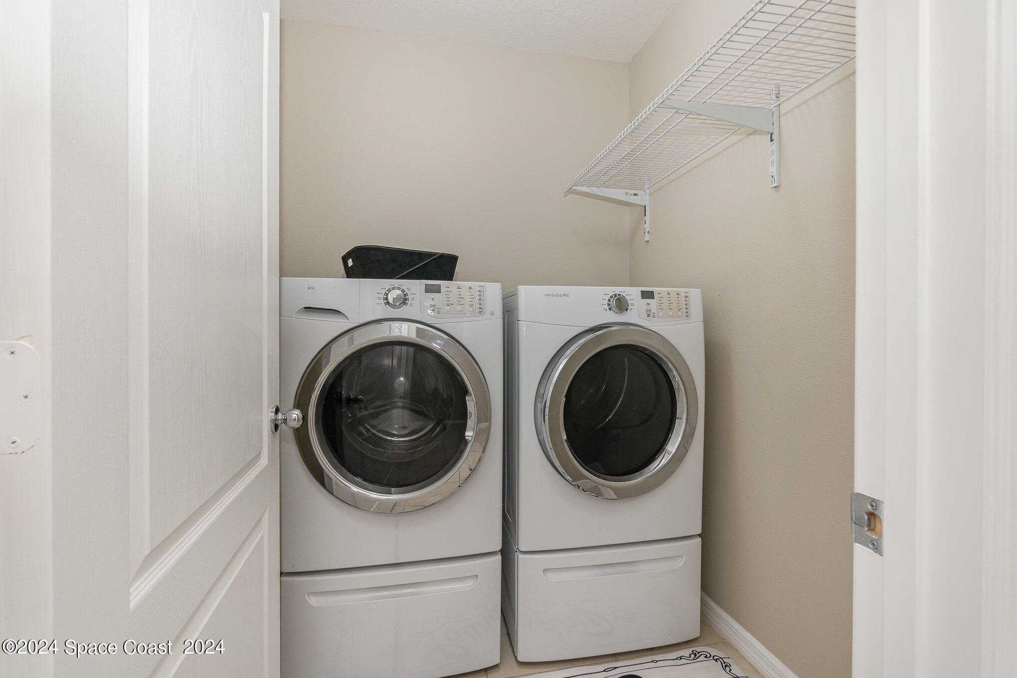 5305 Bear Corn Run Port Orange, FL 32128 - Photo 15 of 33 a utility room with dryer and washer
