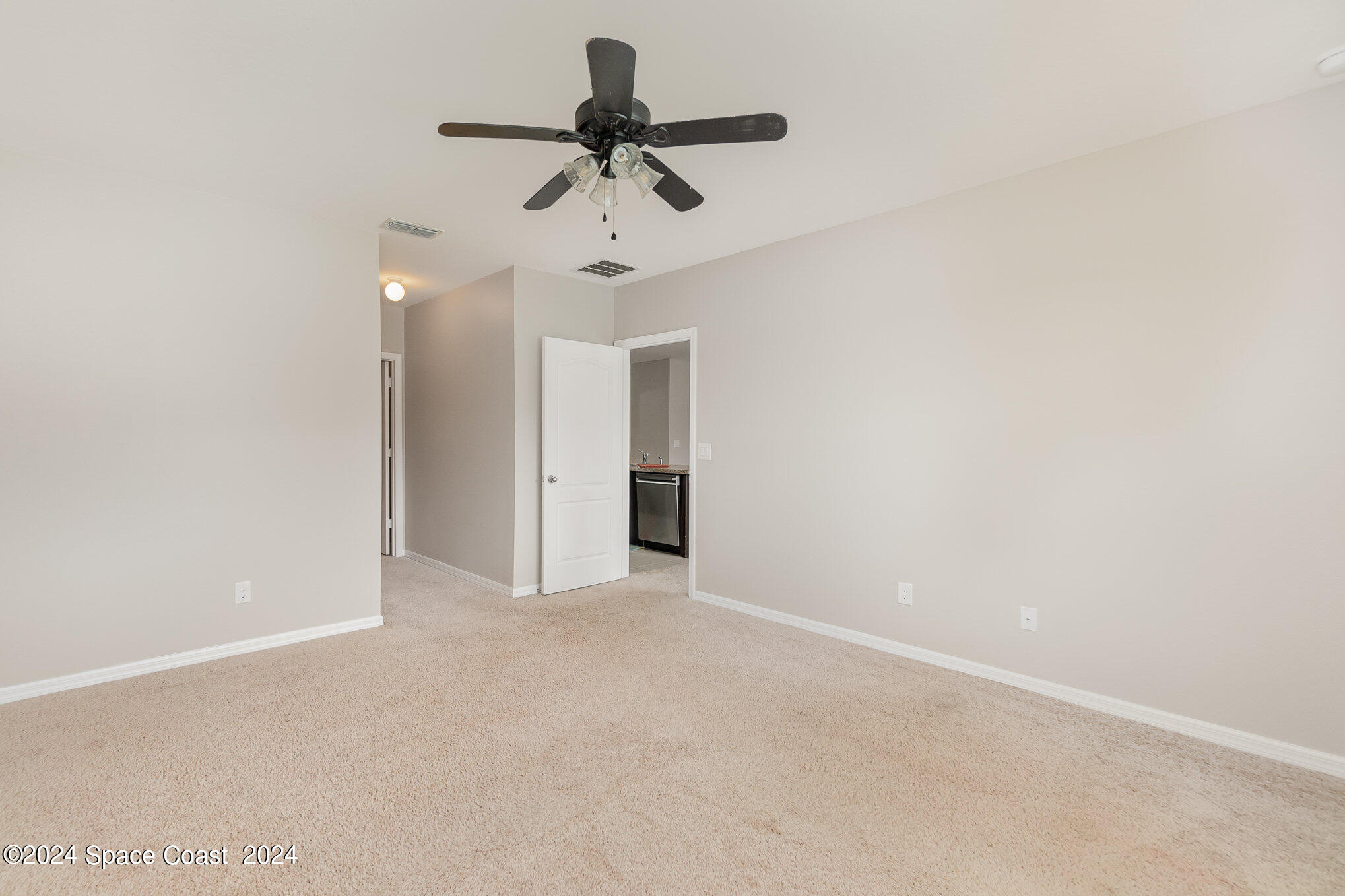 5305 Bear Corn Run Port Orange, FL 32128 - Photo 18 of 33 a view of a room with a ceiling fan