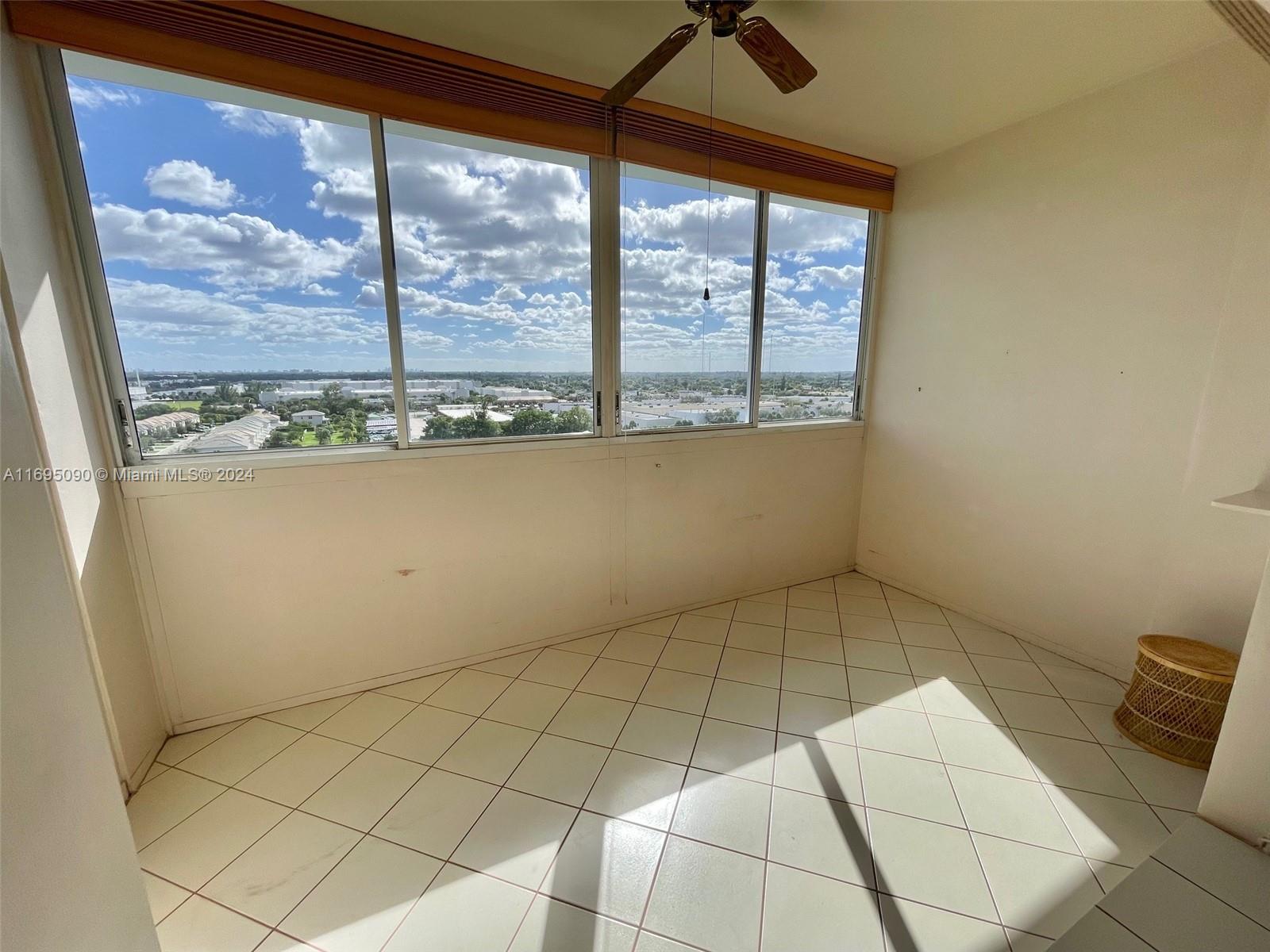 Hillcrest Hollywood, FL 33021 - Photo 13 of 29 a view of a livingroom with an open kitchen and window