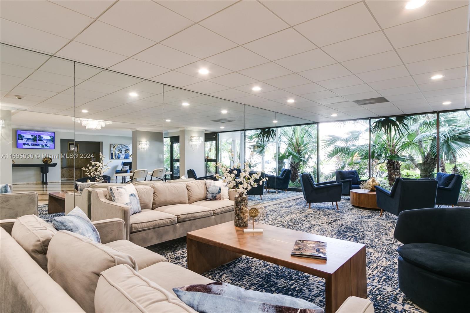 Hillcrest Hollywood, FL 33021 - Photo 14 of 29 a living room with furniture and a large window