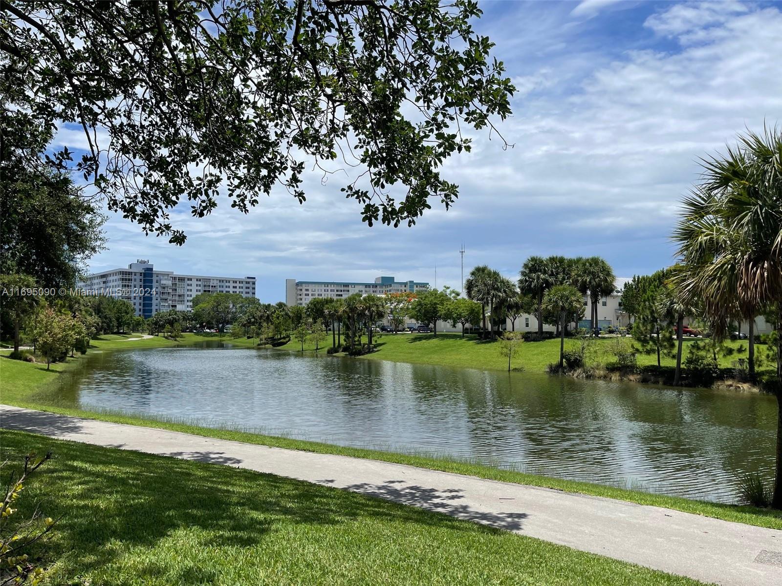 Hillcrest Hollywood, FL 33021 - Photo 21 of 29 a view of a lake with houses in the back