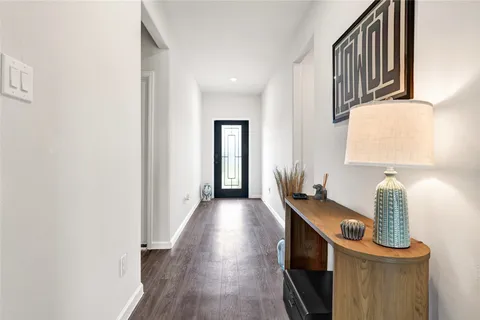 a front view of a house with wooden floor