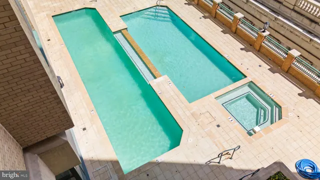 a view of a backyard with sitting area