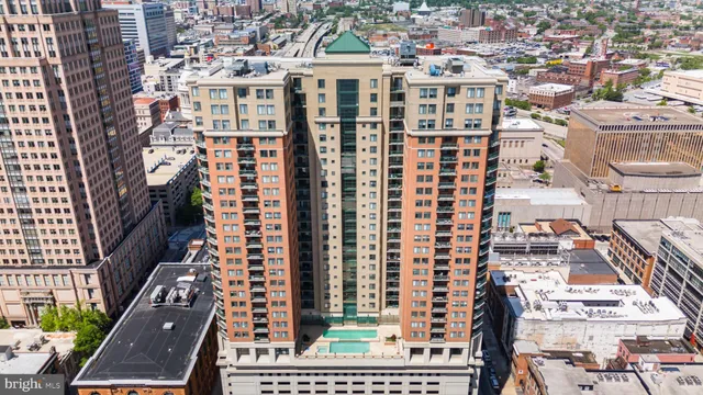 a view of a city with tall buildings